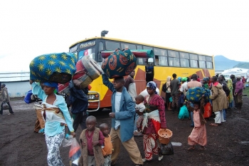 Refugees in transit from the border with DRC to Rwamwanja, Uganda, 2013.