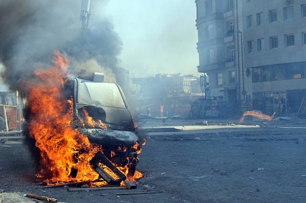 Burning vehicle following a deadly explosion. 