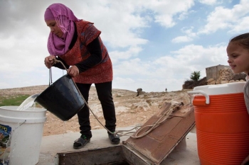 Woman stocking up for water