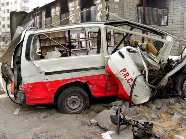 Ambulance nearby Al Quds Hospital, after Israeli shelling