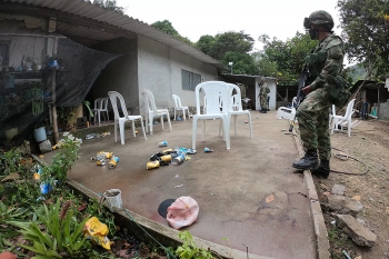 Colombian soldier inspects the Samaniego crime scene in southwestern Colombia  