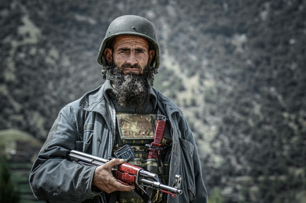 Soldier holding a gun in Kunar, Afghanistan