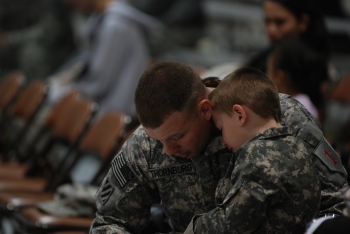 An American soldier with a child