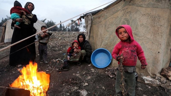 Donne e bambini sfollati dalla regione di Idlib ad Afrin, Siria