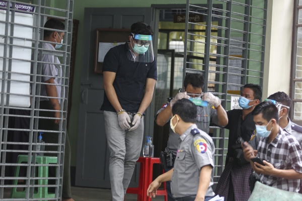 A civilian of Myanmar leaving court after charges filed against him for breaking COVID-19 measures