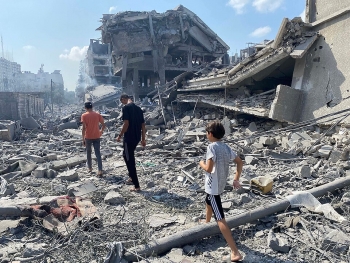 Palestinians inspect the damage, Gaza City on October 9, 2023.