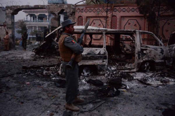 The van blasted by the attackers in front of the Save the Children Jalalabad office 