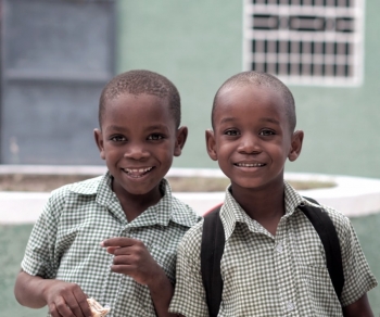  Two schoolboys smiling 