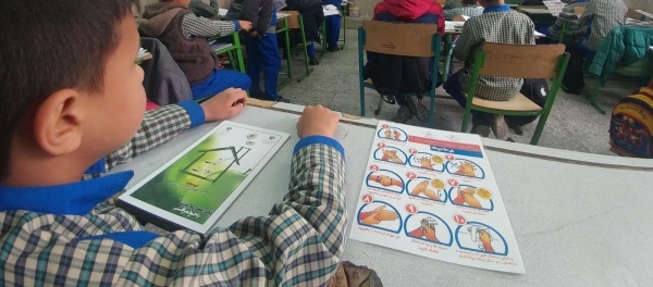 Children at school learn how to wash hands carefully  