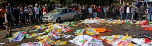 Banners for the planned peace rally were used to cover victims' bodies 
