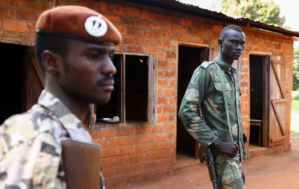 UPC fighters stationed outside a kindergarten in Ngadja. The school has been used as a base since October 2014