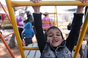 Child in a playground in Homs - Syria