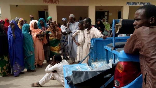  Civilians react at hospital after a suspected Boko Haram attack in Maiduguri
