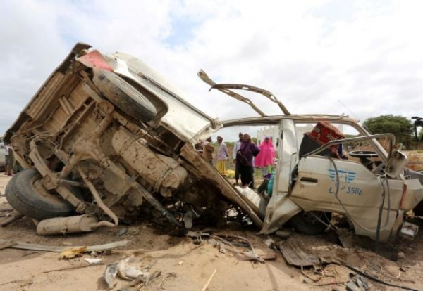 A minibus destroyed in roadside bomb in Lafoole village near Mogadishu, June 30, 2016. 