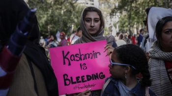 Demonstrators outside of the United Nations Headquarters in New York, USA call for peace in Kashmir.