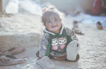  A baby Syrian girl in the rubble
