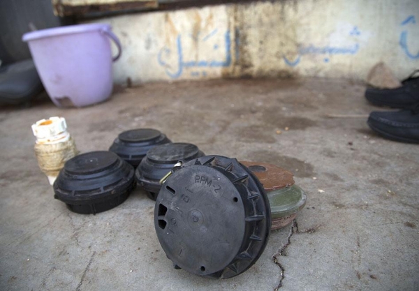 Antipersonnel landmines in front of a shop used to store shells and landmines by Taher Humaid, who heads the Taizz National Association for Demining, June 11, 2016. 