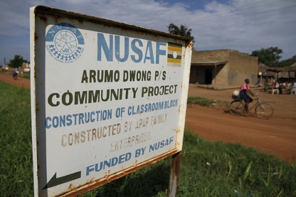 Sign that acknowledges a World Bank program of financing in a community project in Uganda 