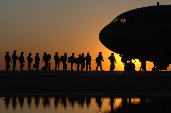 Soldiers boarding a plane 