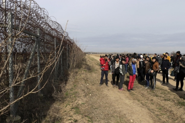 Migrants wait at the Turkey-Greece border in Pazarkule, Edirne, Turkey.