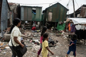 Children walking through the streets of a slum