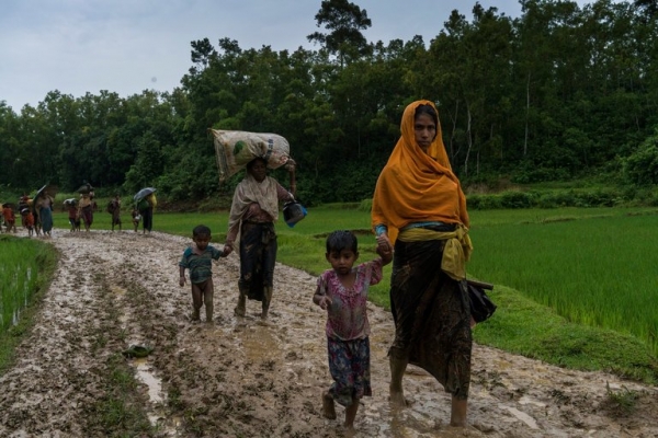 Rohingya refugees after crossing the border illegally near Amtoli