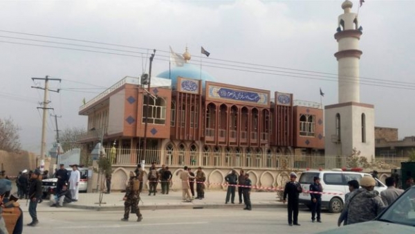 Security forces outside the the Baqir ul-Uloom mosque, following the suicide attack which killed over 30 worshippers 