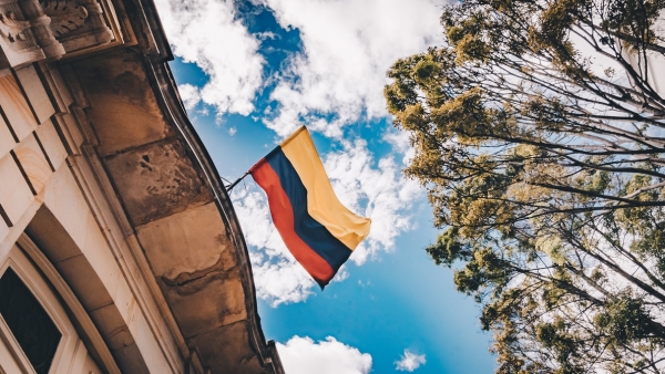 The Colombian flag waving over a building in Bogota 