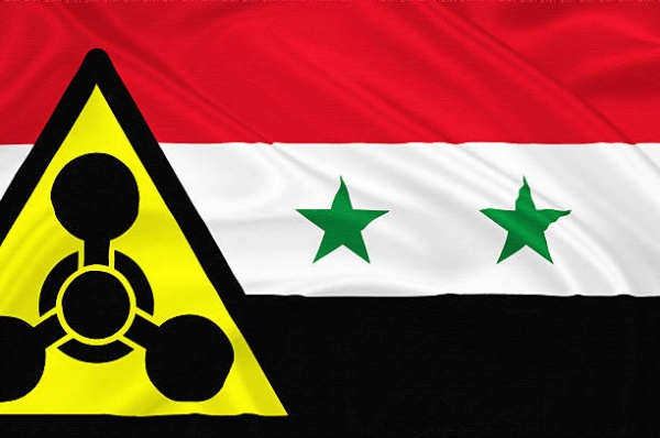 Simbolo internazionale delle armi chimiche disegnato sulla bandiera siriana