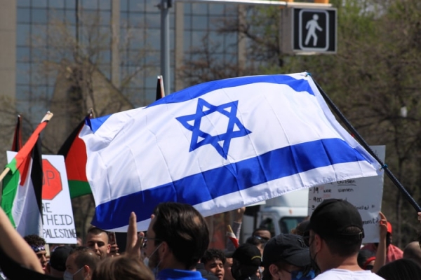 Flags of Israel and Palestine at a protest 