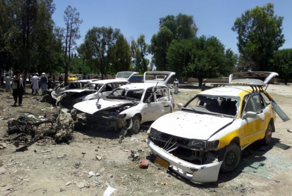 Damaged vehicles pictured after the suicide car bomb attack in Khost