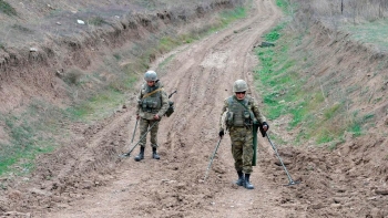 Azerbaijan military clearing mines outside the town of Fuzuli, Azerbaijan