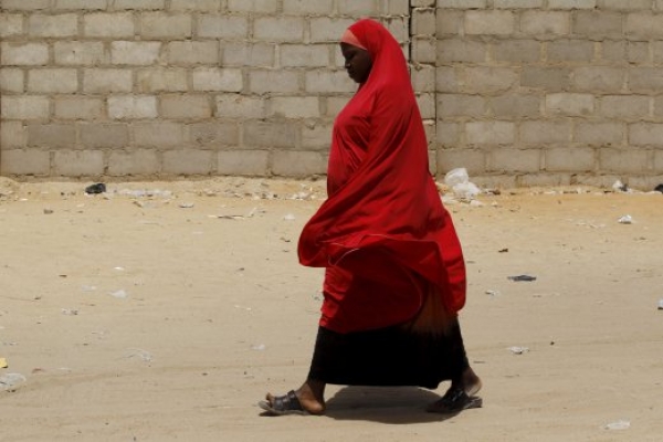 A woman walking in Maiduguri camp, Nigeria