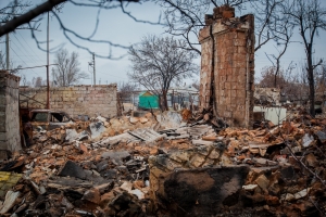 damaged buildings and houses in the war-torn city of Debal&#039;tseve in Donbass region