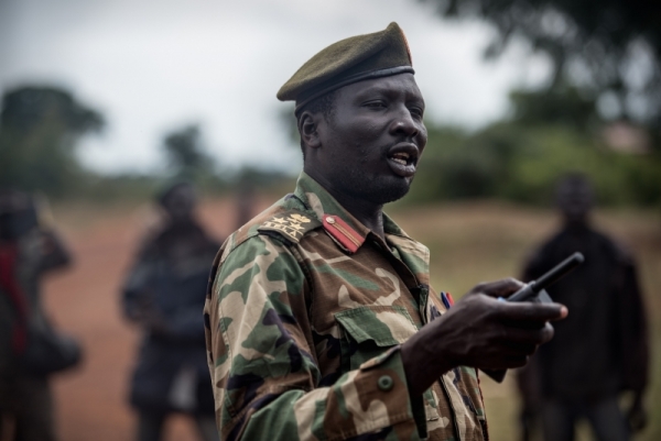 General Moses Lojuko of the rebels speaks to troops in Loopo town of Kajo Keji county.