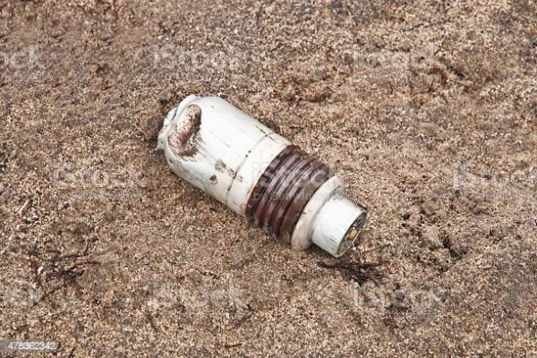 An unexploded grenade on the battlefield