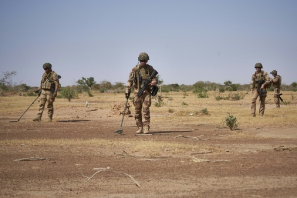 French soldiers search for improvised explosive devices (IEDs) in the Sahel region