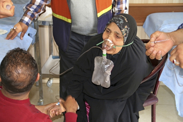 A victim exposed to an apparent chemical attack receives treatment at a hospital in Taza, 10 miles south of Kirkuk, Iraq. 