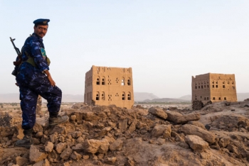 An armed policeman in the district of Marib, Yemen
