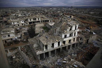 Edifici distrutti da armi esplosive nelle vicinanze di Ramouseh nella parte orientale di Aleppo, Siria