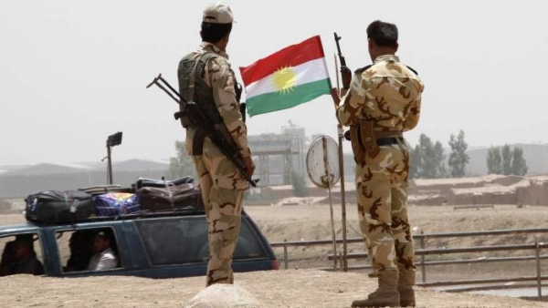 Kurdish security forces at a checkpoint on the outskirts of Kirkuk
