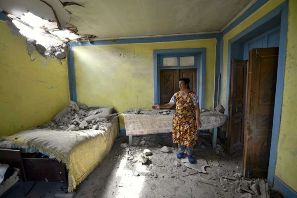 Woman’s house after shelling by Armenian forces in the Tovuz Region 