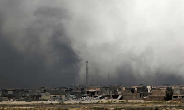 Smoke billows following shelling, Fallujah, Iraq 
