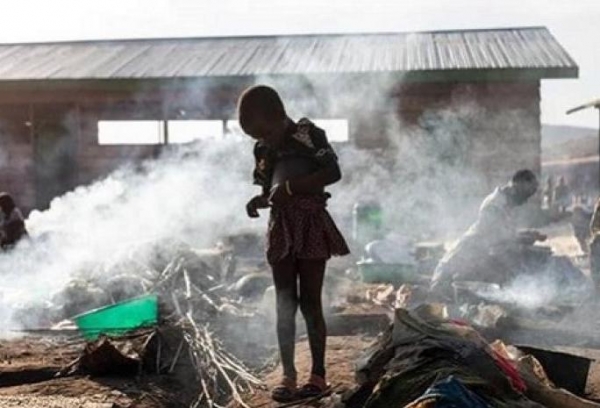 A child stands in the middle of a displacement site in Ituri province of DRC