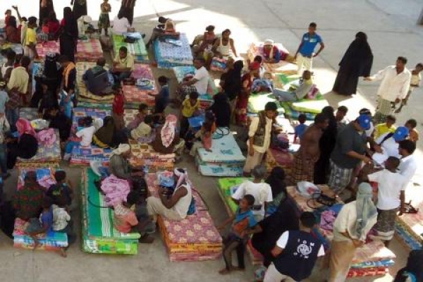 IDPs assisted by OIM officials and volunteers
