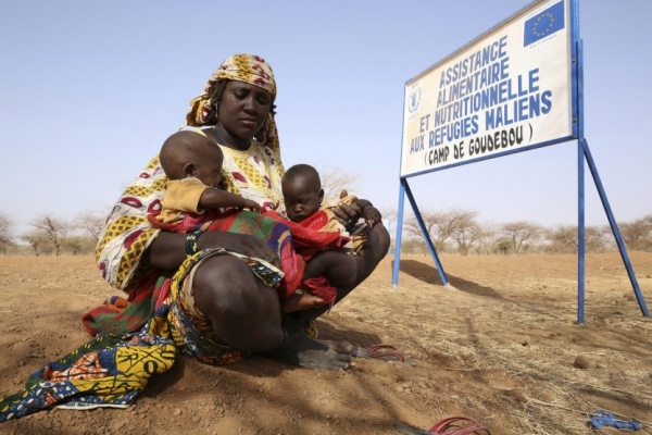 A Malian woman at the entrance of Goudobou camp in Burkina Faso