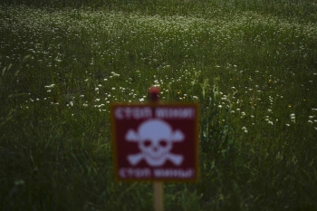 A danger sign warning about land mines, outside Kyiv