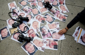 Pictures of murdered Mexican journalists exhibited during a protest after the killing of Javier Valdez in Mexico City, May 16   