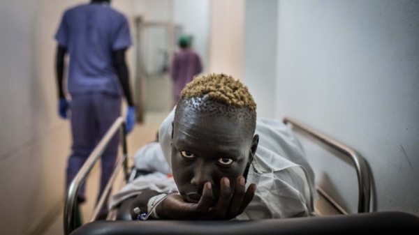 A young patient awaits for his surgery at Juba Military Hospital