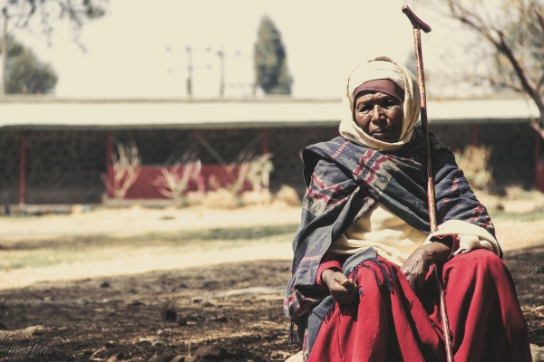 Woman sitting near a building in Addis Abeba